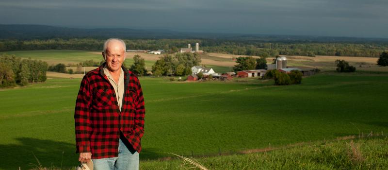 Ed Slocum overlooking farm