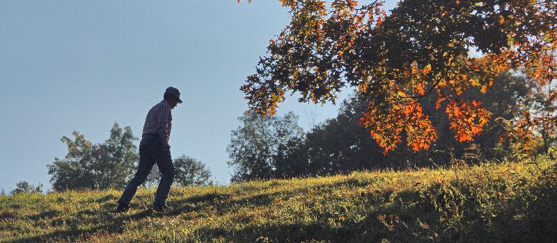 Walter Buck walking up hill